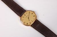 Lot 558 - A gentleman's Garrard wristwatch, the oval...