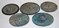 Lot 589 - A Chinese bronze plaque, of circular form,...