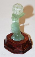 Lot 592 - A Chinese jadeite carving in the form of an...