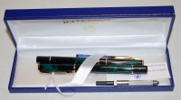 Lot 594 - A Waterman's faux malachite and gilt banded...