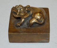 Lot 610 - A reproduction Chinese bronze desk seal,...