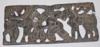 Lot 618 - An Islamic pierced bronze plaque, relief...