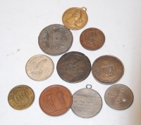 Lot 634 - A small collection of assorted coins, medals...