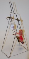 Lot 665 - Amid 20th century clockwork tinplate trapeze...