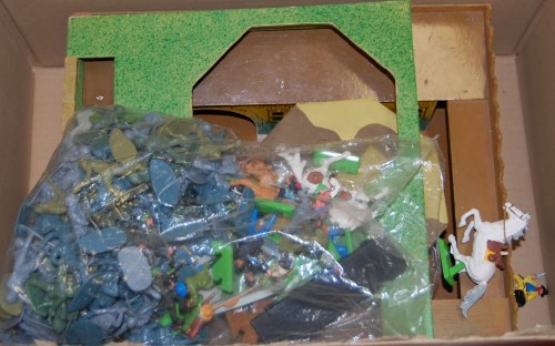Lot 736 - A childs toy fort, with plastic characters