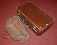 Lot 835 - A vintage early 20th century leather travel...