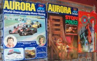 Lot 859 - Three various boxed Aurora and Scalextric slot...