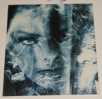 Lot 1013 - A blue toned gelatin silver print...