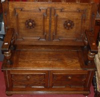 Lot 1131 - An early 20th century geometric moulded oak...