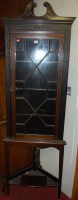 Lot 1142 - A circa 1900 mahogany single door astragal...