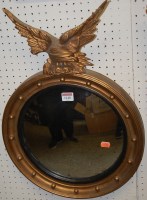 Lot 1148 - A Regency style gilt circular convex wall...