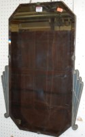 Lot 1149 - An Art Deco steel bevelled wall mirror, the...