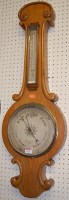 Lot 1151 - A mid Victorian oak two-dial wheel barometer,...