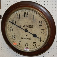 Lot 1153 - A Victorian oak circular wall clock, the...