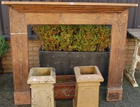 Lot 1163 - A stained pine fire surround, 125 x 146cm