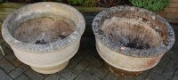 Lot 1165 - A pair of large reconstituted stone circular...