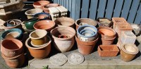 Lot 1171 - A large collection of mostly terracotta plant...