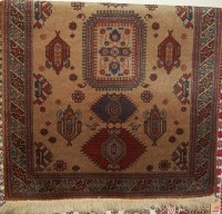 Lot 1191 - A Persian style floral geometric decorated...