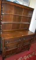 Lot 1201 - A 17th century style moulded and joined oak...