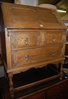 Lot 1221 - An early 20th century geometric moulded oak...