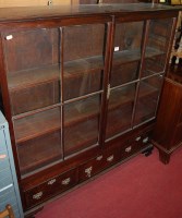 Lot 1230 - An antique mahogany double door glazed...