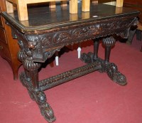 Lot 1240 - A late 19th century heavily carved oak single...