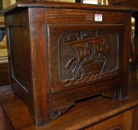 Lot 1243 - A small relief carved oak hinge-top table box,...