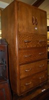 Lot 1248 - A 1930s oak compactum chest having twin...