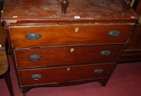 Lot 1260 - A 19th century mahogany chest of three long...