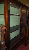 Lot 1266 - A large mahogany double door glazed china...