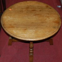 Lot 1273 - A moulded oak low circular occasional table,...