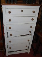 Lot 1279 - A rustic pine and white painted chest of six...