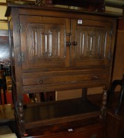 Lot 1295 - A contemporary moulded oak and linenfold...