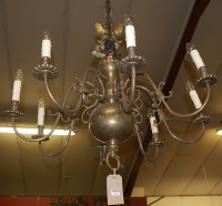 Lot 1305 - A large Dutch brass hanging eight light...