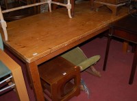 Lot 1325 - A pine farmhouse style kitchen table, of plain...