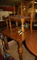 Lot 1347 - A 1930s moulded oak drawleaf dining table,...