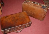 Lot 1352 - An early 20th century tan leather suitcase,...