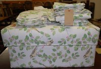 Lot 1355 - A Laura Ashley upholstered ottoman; together...