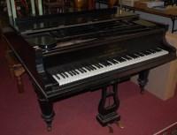 Lot 1359 - An early 20th century ebonised baby grand...