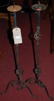 Lot 1366 - A pair of Gothic style wrought iron...