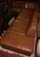 Lot 1386 - A contemporary tan leather upholstered four...