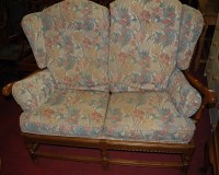 Lot 1413 - A contemporary Ercol mid elm three piece...