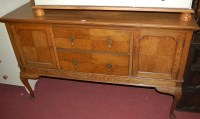 Lot 1432 - An early 20th century oak dresser base, having...