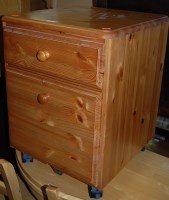 Lot 1451 - A modern pine round cornered two drawer office...