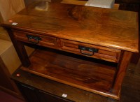 Lot 1469 - A contemporary Eastern teak two drawer low two-...