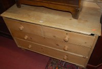 Lot 1478 - A Victorian pine ledgeback chest of two short...