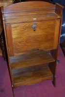 Lot 1486 - An early 20th century oak student's bureau,...