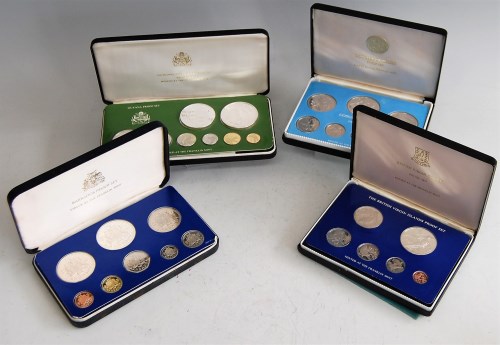 Lot 2177 - Four various proof sets to include a 1975...