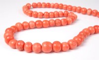 Lot 2504 - A coral bead necklace, the slightly graduated...
