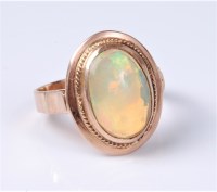 Lot 2505 - An opal ring, the oval cabochon approx. 12.8 x...